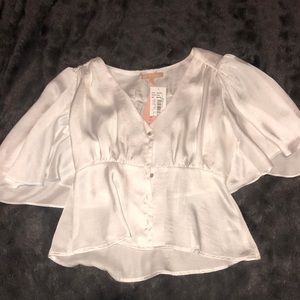 A silky white top with buttons!